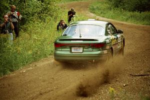 Tad Ohtake / Martin Dapot Ford Escort ZX2 at the spectator point on SS9 (The Spurs).