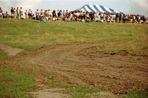 View of a sharp hairpin and the crowd on the hill on SS10 (NJK Ranch).