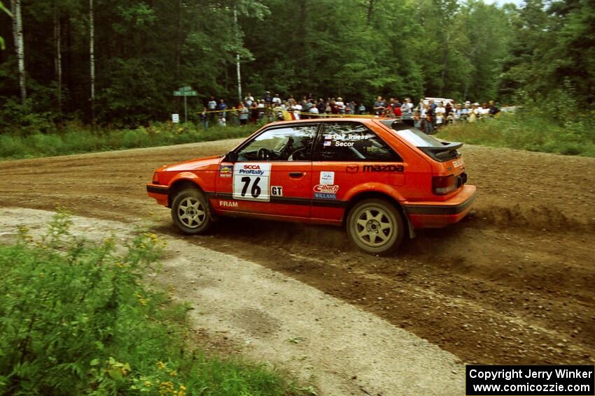 Gail Truess / Jeff Secor Mazda 323GTX at the spectator point on SS9 (The Spurs).
