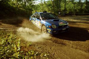 Karl Scheible / Brian Maxwell Subaru WRX STi powers out of a sharp left-hander on SS13 (Steamboat).