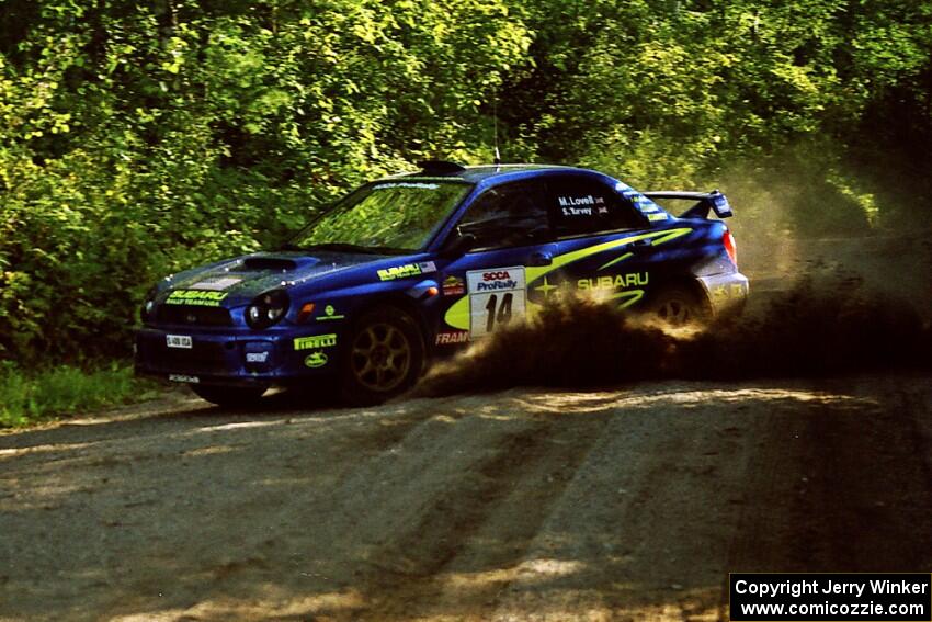 Mark Lovell / Steve Turvey Subaru WRX STi powers out of a sharp left-hander on SS13 (Steamboat).