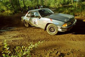 Mike Hurst / Rob Bohn Ford Mustang powers out of a sharp left-hander on SS13 (Steamboat).