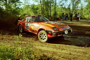 Andrew Havas / John Allen Mazda RX-7 powers out of a sharp left-hander on SS13 (Steamboat).