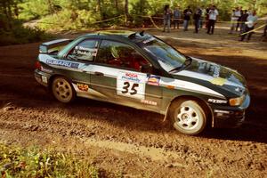 Lee Shadbolt / Bob Sherman Subaru Impreza powers out of a sharp left-hander on SS13 (Steamboat).