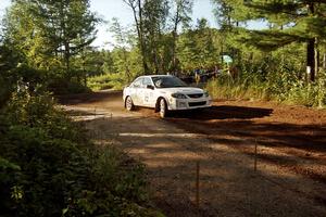 Eric Burmeister / Eric Adams Mazda Protege' MP3 powers out of a sharp left-hander on SS13 (Steamboat).