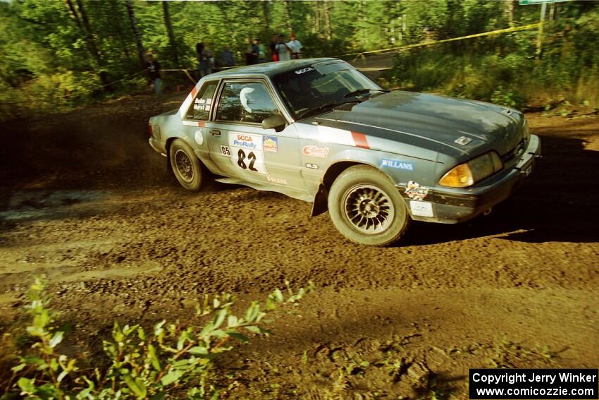 Mike Hurst / Rob Bohn Ford Mustang powers out of a sharp left-hander on SS13 (Steamboat).