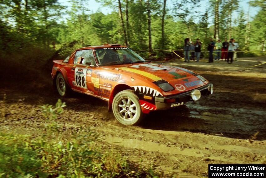 Andrew Havas / John Allen Mazda RX-7 powers out of a sharp left-hander on SS13 (Steamboat).