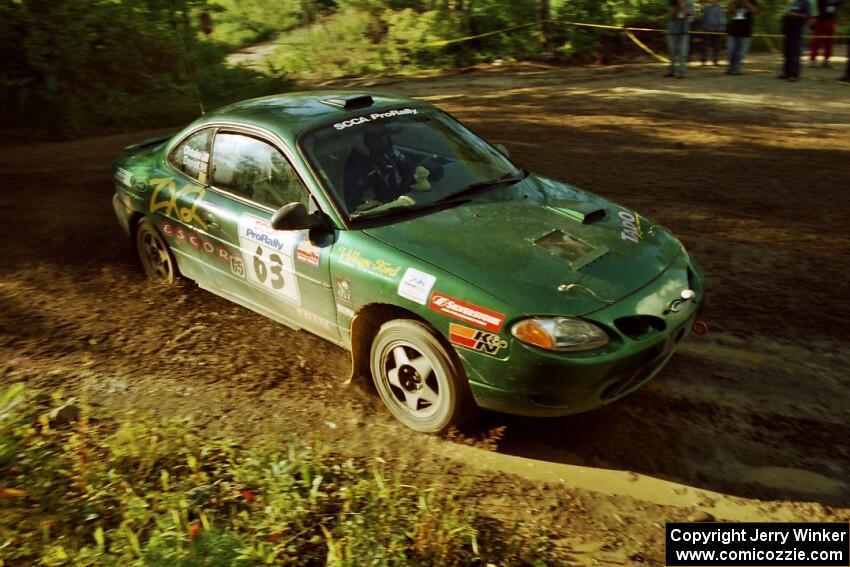 Tad Ohtake / Martin Dapot Ford Escort ZX2 powers out of a sharp left-hander on SS13 (Steamboat).