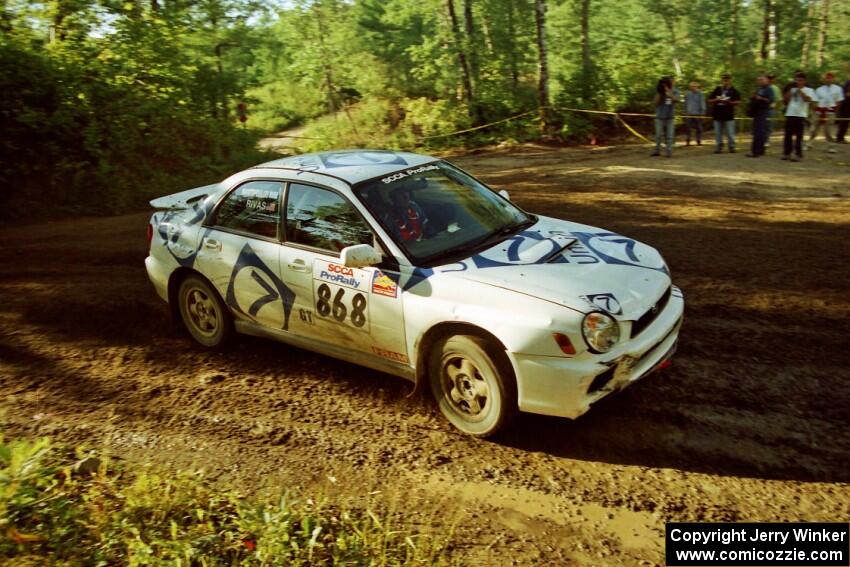 Jason Rivas / Constantine Mantopolous Subaru WRX powers out of a sharp left-hander on SS13 (Steamboat).