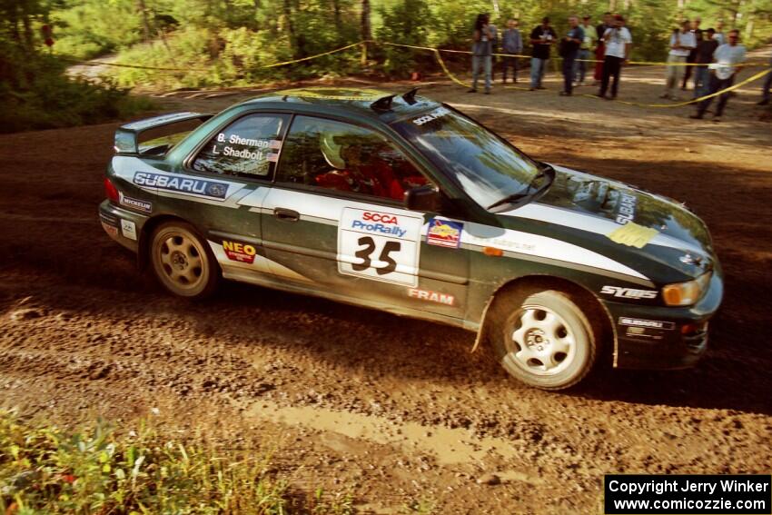 Lee Shadbolt / Bob Sherman Subaru Impreza powers out of a sharp left-hander on SS13 (Steamboat).