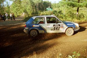 Chris Whiteman / Dave Hackett VW GTI powers out of a sharp left-hander on SS13 (Steamboat).