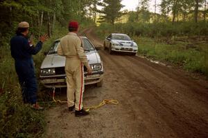 Bob Burtis / Rick Burtis Audi Quattro Coupe are stopped by the side of the road on SS13 (Steamboat).