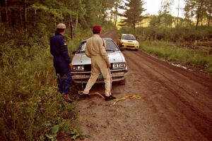 Bob Burtis / Rick Burtis Audi Quattro Coupe are stopped by the side of the road on SS13 (Steamboat).