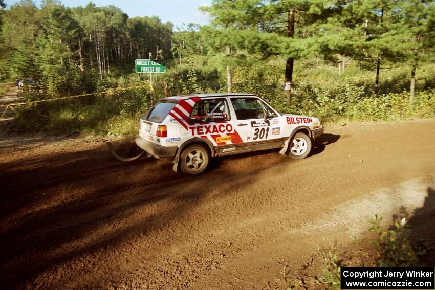 Tony Chavez / Doug Robinson VW GTI powers out of a sharp left-hander on SS13 (Steamboat).