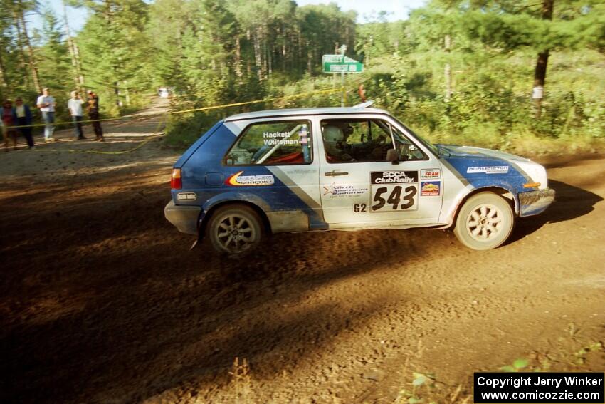 Chris Whiteman / Dave Hackett VW GTI powers out of a sharp left-hander on SS13 (Steamboat).