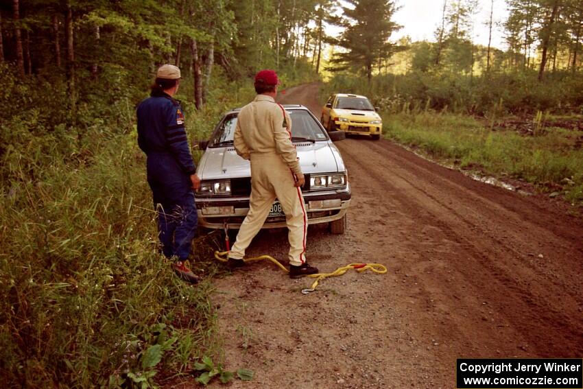 Bob Burtis / Rick Burtis Audi Quattro Coupe are stopped by the side of the road on SS13 (Steamboat).