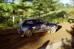 Dan Moore / John Hopponen Suzuki Swift GTi at speed on SS13 (Steamboat).