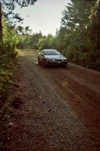 Paul Peters / Bob Anderson Mitsubishi Eclipse GSX at speed on SS13 (Steamboat).