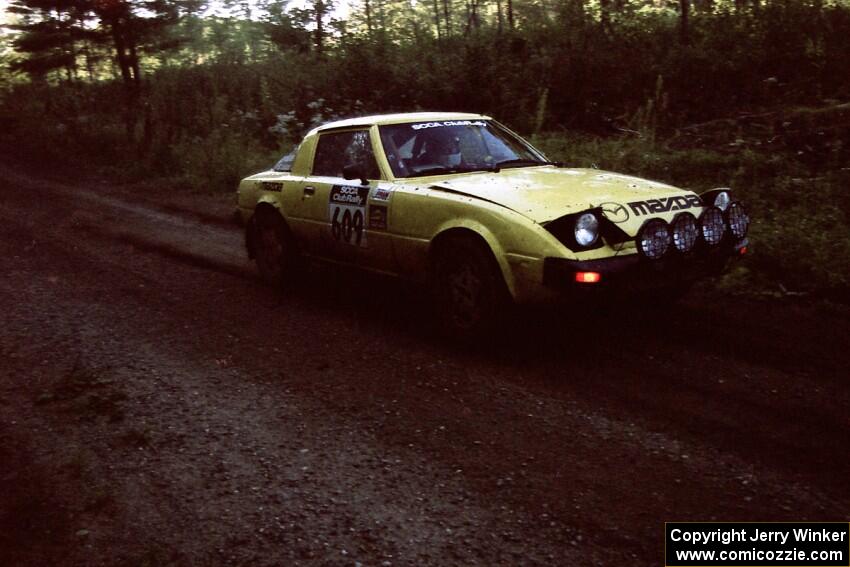 Scott Justus / Sumit Panjabi Mazda RX-7 at speed on SS13 (Steamboat).