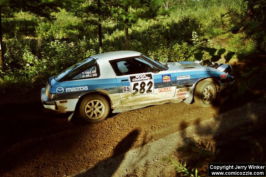 Doug Dill / Tyler Dill Mazda RX-7 at speed on SS13 (Steamboat).