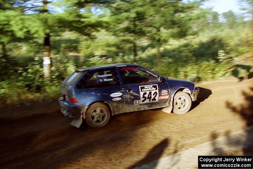 Dan Moore / John Hopponen Suzuki Swift GTi at speed on SS13 (Steamboat).