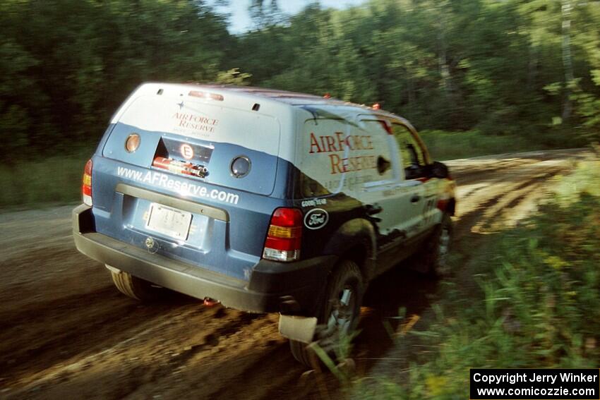 Greg Pachman / Ray Summers Ford Escape at speed on SS13 (Steamboat).