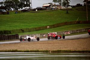 Marc-Antoine Camirand's Van Diemen RF00 and Memo Rojas' Van Diemen RF00 follow the pace car.