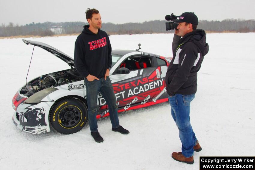 Josh Robinson is interviewed in front of his Nissan 350Z.