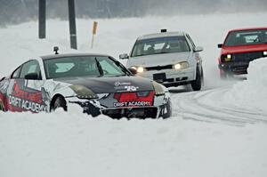 Josh Robinson's Nissan 350Z, John Kochevar's VW Golf and Mark Knepper's VW GTI