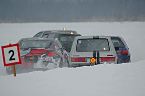 Josh Robinson's Nissan 350Z and Matt Bjorge's VW Rabbit make contact.