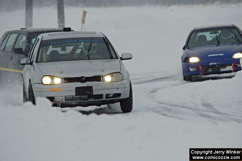 John Kochevar's VW Golf, Mark Olson's VW Golf and Mark Utecht's Honda Civic