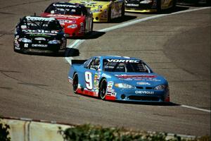 Johnny Sauter's Chevy Monte Carlo gets a few car lengths lead on the field