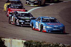 Johnny Sauter's Chevy Monte Carlo holds on to the lead