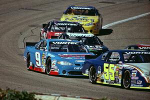 (55) Greg Williams' Chevy Monte Carlo and (9) Johnny Sauter's Chevy Monte Carlo