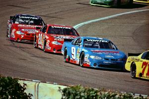 (9) Johnny Sauter's Chevy Monte Carlo, (20) Steve Carlson's Chevy Monte Carlo and (7) Gary St. Amant's Chevy Monte Carlo