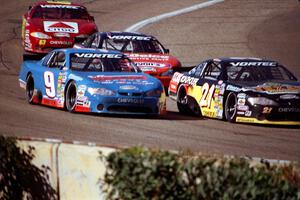 Johnny Sauter's Chevy Monte Carlo and (21) Kevin Cywinski's Chevy Monte Carlo battle