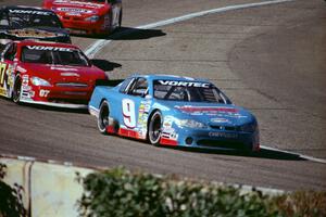 Johnny Sauter's Chevy Monte Carlo leads