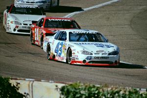 (43) Dick Trickle's Chevy Monte Carlo, (20) Steve Carlson's Chevy Monte Carlo and (29) Francesco Gaudesi's Chevy Monte Carlo