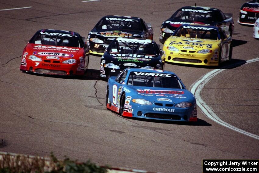 Johnny Sauter's Chevy Monte Carlo grabs the lead on the first lap