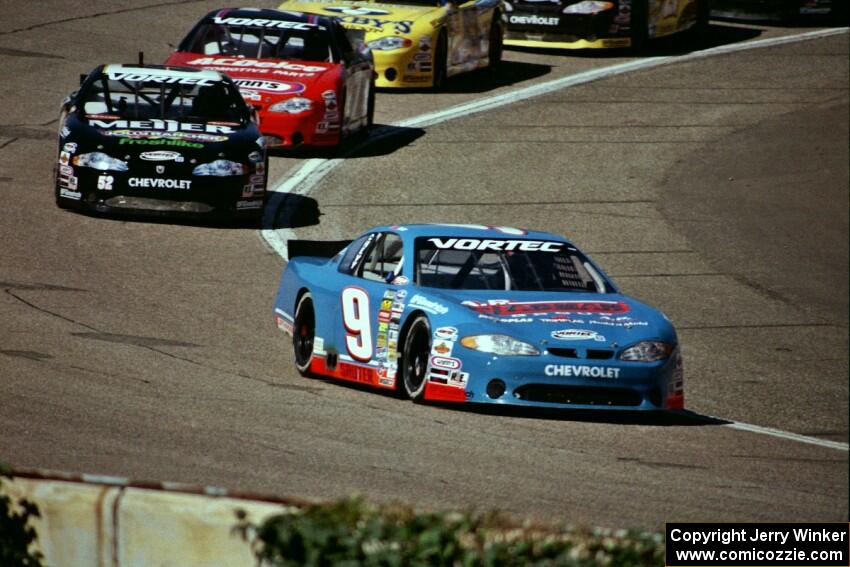 Johnny Sauter's Chevy Monte Carlo gets a few car lengths lead on the field