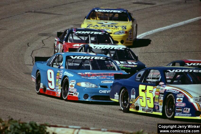 (55) Greg Williams' Chevy Monte Carlo and (9) Johnny Sauter's Chevy Monte Carlo