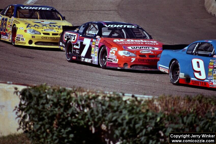 (9) Johnny Sauter's Chevy Monte Carlo, (7) Gary St. Amant's Chevy Monte Carlo and (83) Joey Clanton's Chevy Monte Carlo