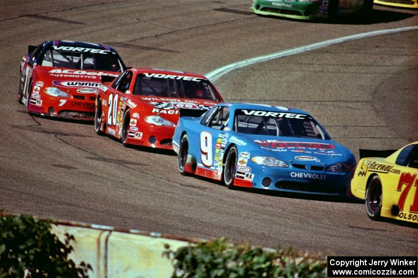 (9) Johnny Sauter's Chevy Monte Carlo, (20) Steve Carlson's Chevy Monte Carlo and (7) Gary St. Amant's Chevy Monte Carlo