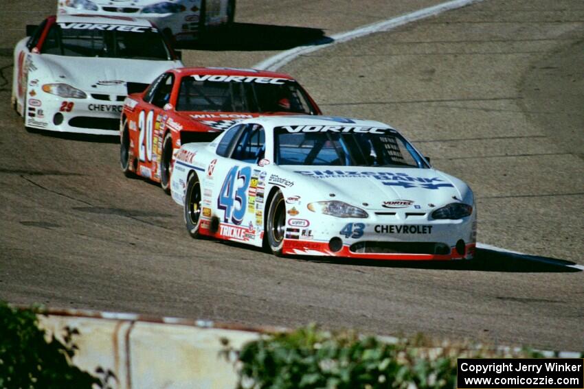 (43) Dick Trickle's Chevy Monte Carlo, (20) Steve Carlson's Chevy Monte Carlo and (29) Francesco Gaudesi's Chevy Monte Carlo