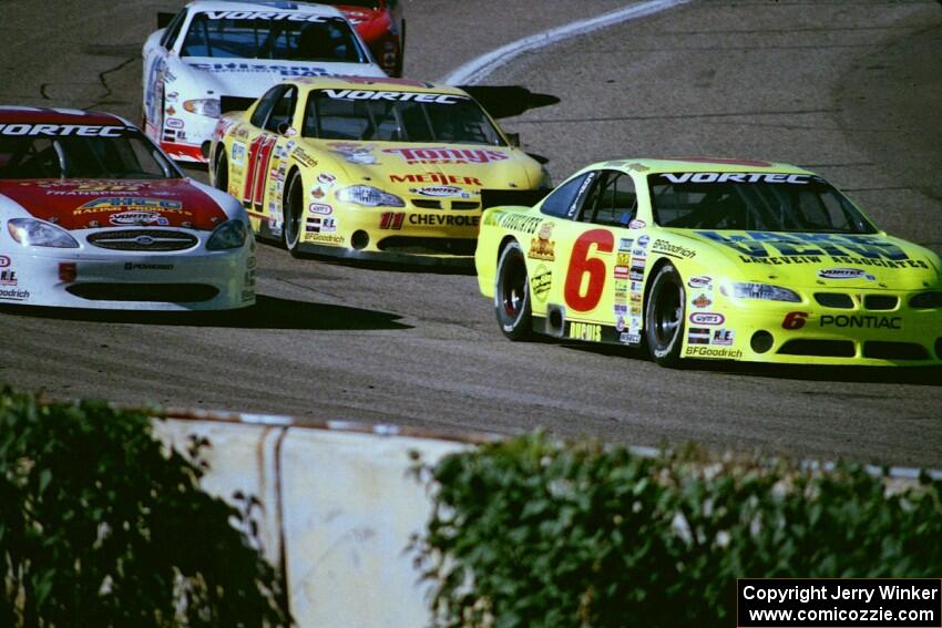 Tristan Dupuis' Chevy Monte Carlo holds off three ASA legends