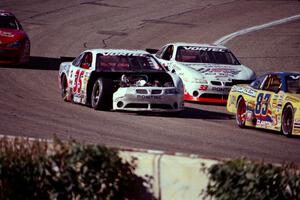 (35) Ricky Bryant's Pontiac Grand Prix shows battle scars