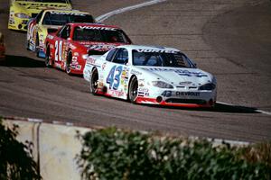 (43) Dick Trickle's Chevy Monte Carlo, (20) Steve Carlson's Chevy Monte Carlo and (94) Paul Paine's Pontiac Grand Prix