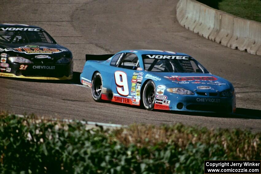 (9) Johnny Sauter's Chevy Monte Carlo and (21) Kevin Cywinski's Chevy Monte Carlo