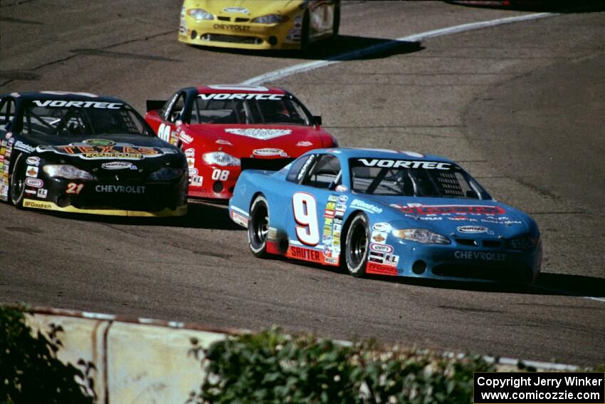 (9) Johnny Sauter's Chevy Monte Carlo, (21) Kevin Cywinski's Chevy Monte Carlo and (08) John Silverthorne's Chevy Monte Carlo