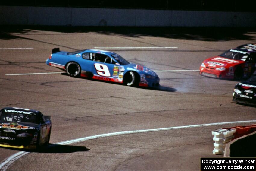 Johnny Sauter's Chevy Monte Carlo spins in front of Gary St. Amant's Chevy Monte Carlo